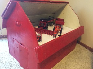 Childhood red toy barn- perfect to showcase grown-up toys